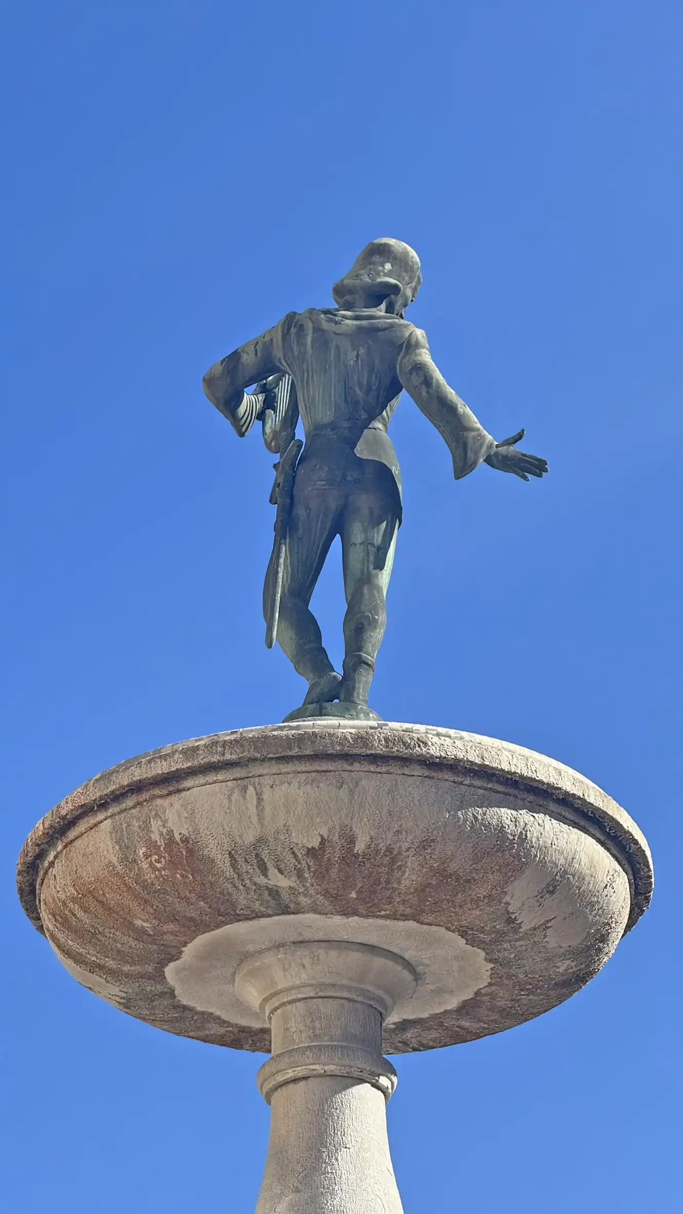 "Walther von der Vogelweide" sculpture, viewed from the back