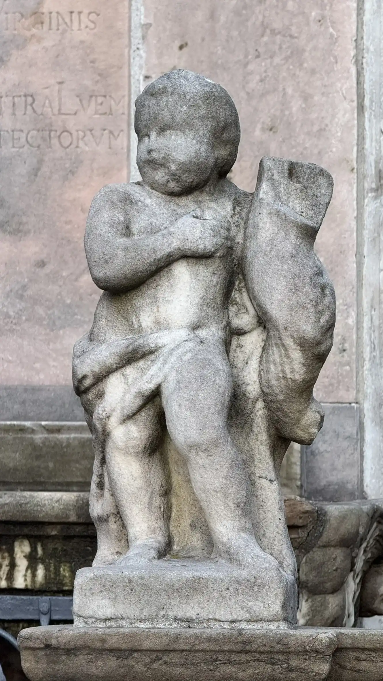 Putto holding candle