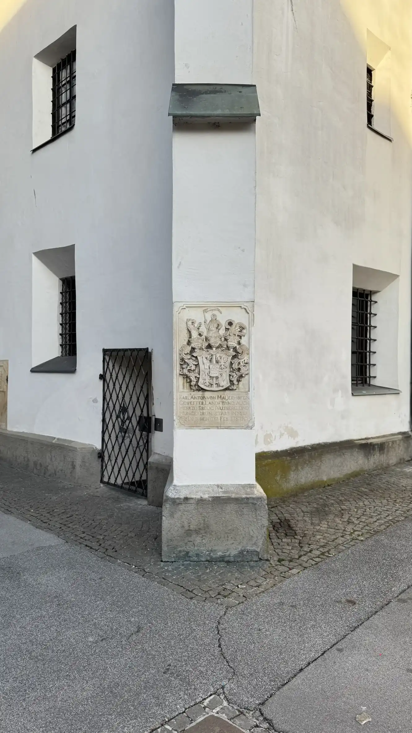 Tombstone embedded in the facade