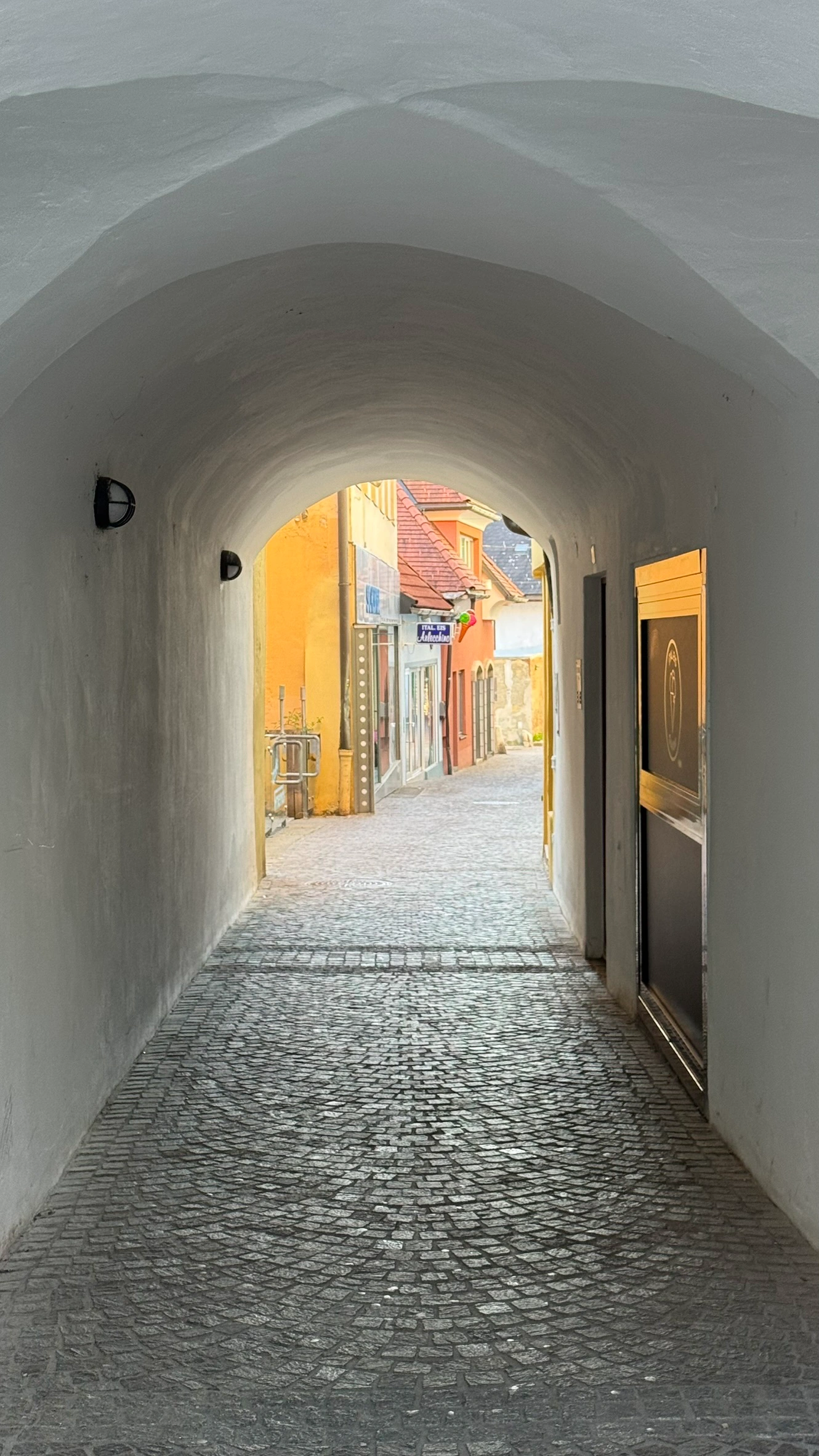 Arched passage with a view of Postgasse