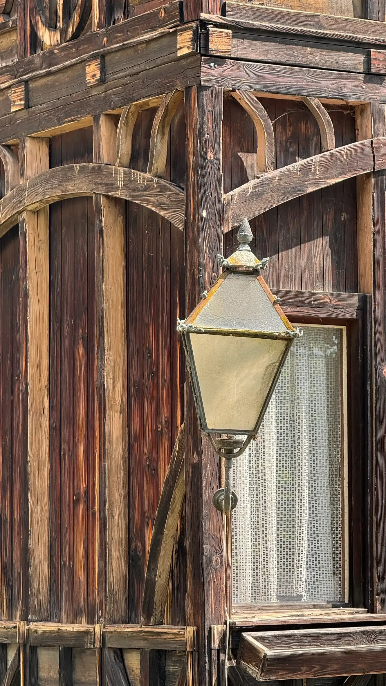 Historical wall-mounted lantern adds period character