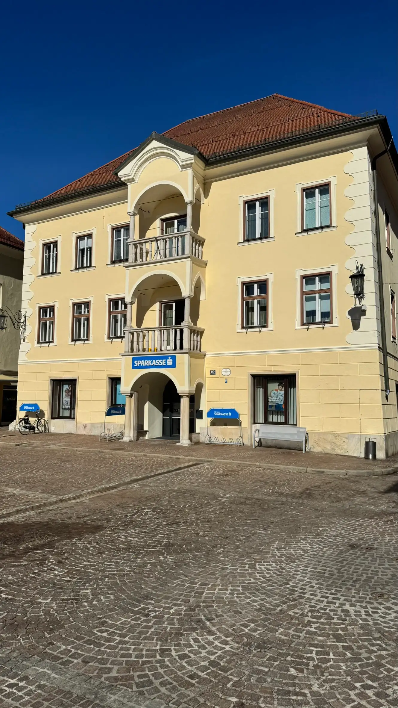 Carinthia House, at the eastern end of the square, has a Late-Gothic core and an Early Baroque facade.