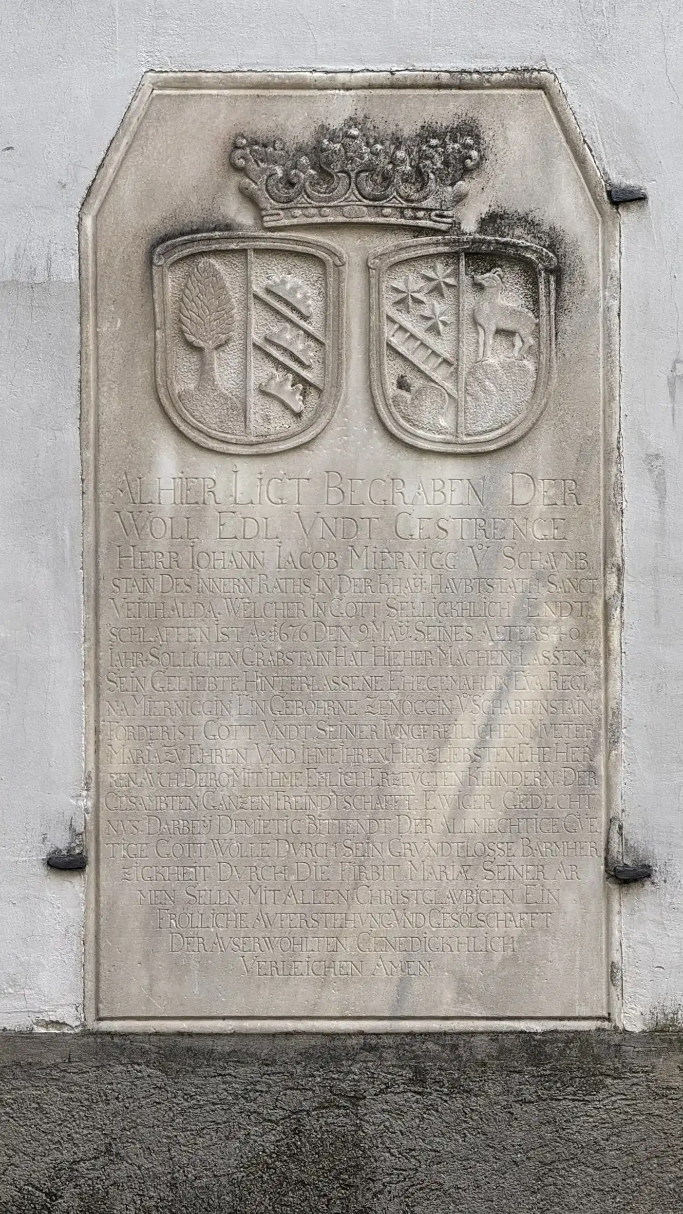 Tombstone embedded in the facade