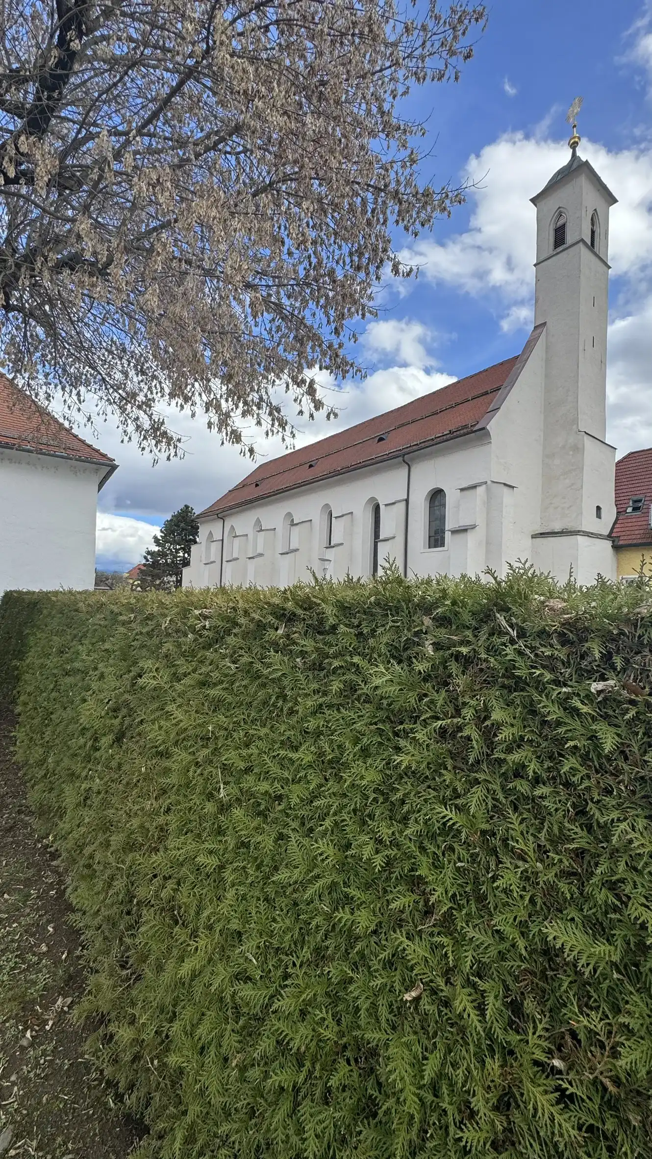 The tower and the north-west facade of the monastery church