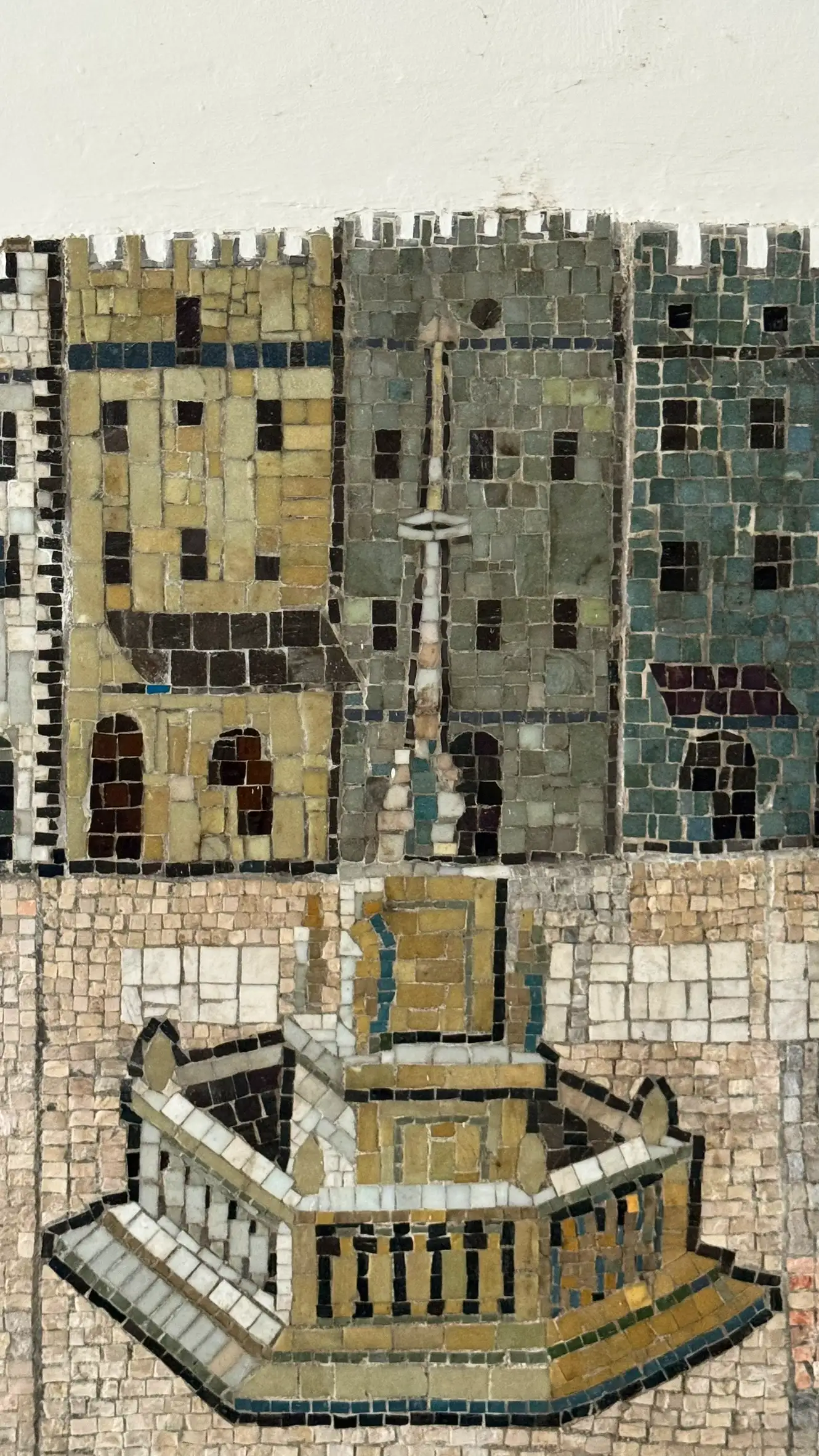 Tesserae colours: greyish olive, pale brown, silver, teal blue, black