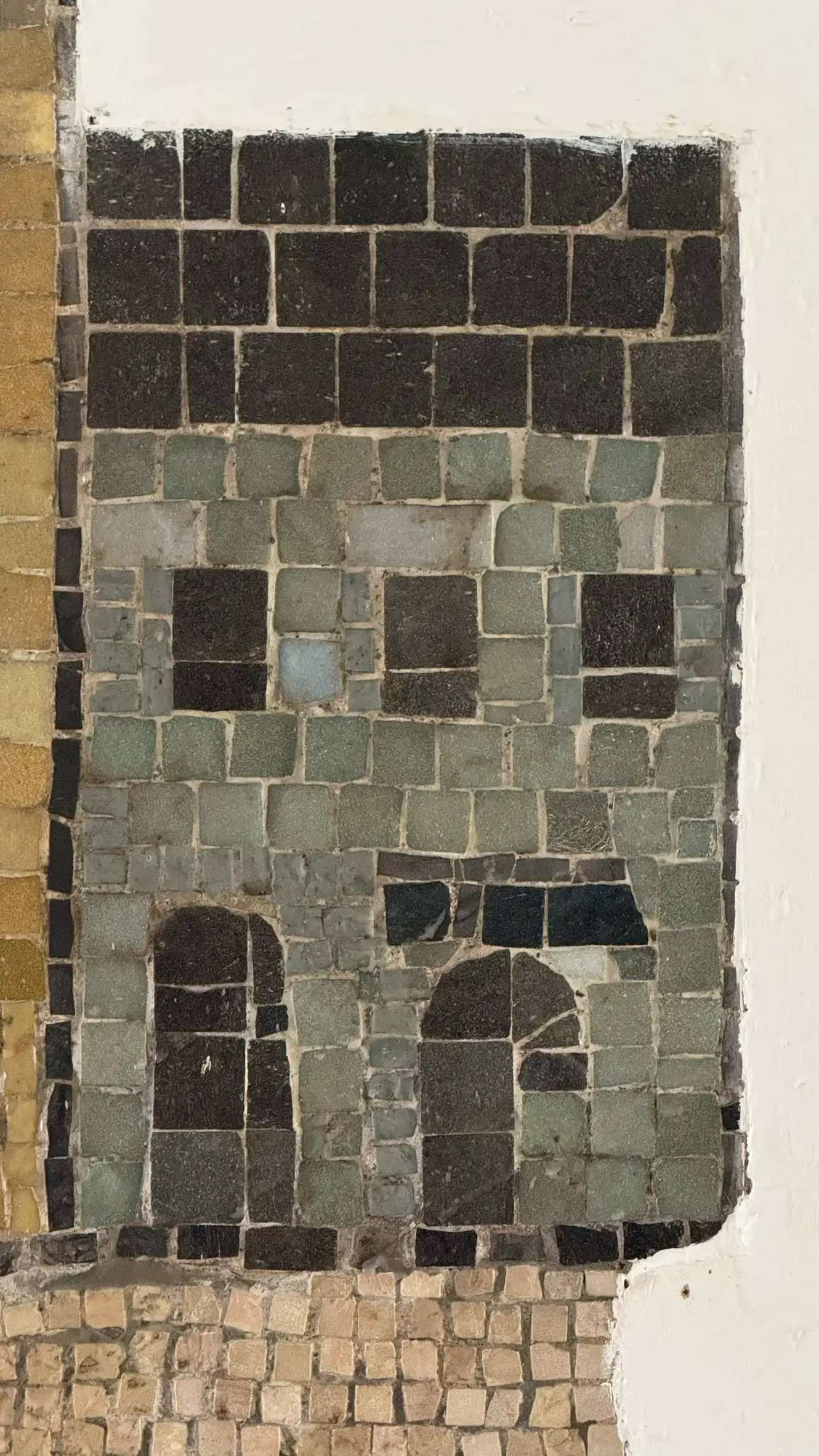 Tesserae colours: grey olive, pale brown, black