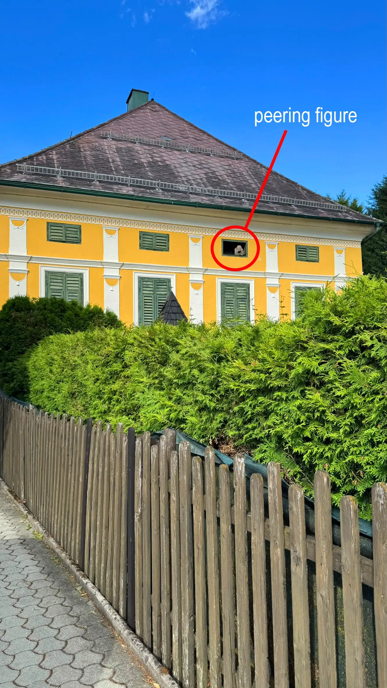 South-west facade with four bays; window-gazer on third bay from left